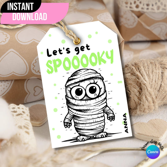 Mummy-themed Halloween printable tag showcased on a brown gift box.