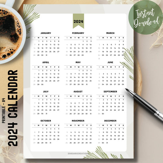 2024 full year nature-themed calendar on brown desk with coffee cup on left and pen on right.