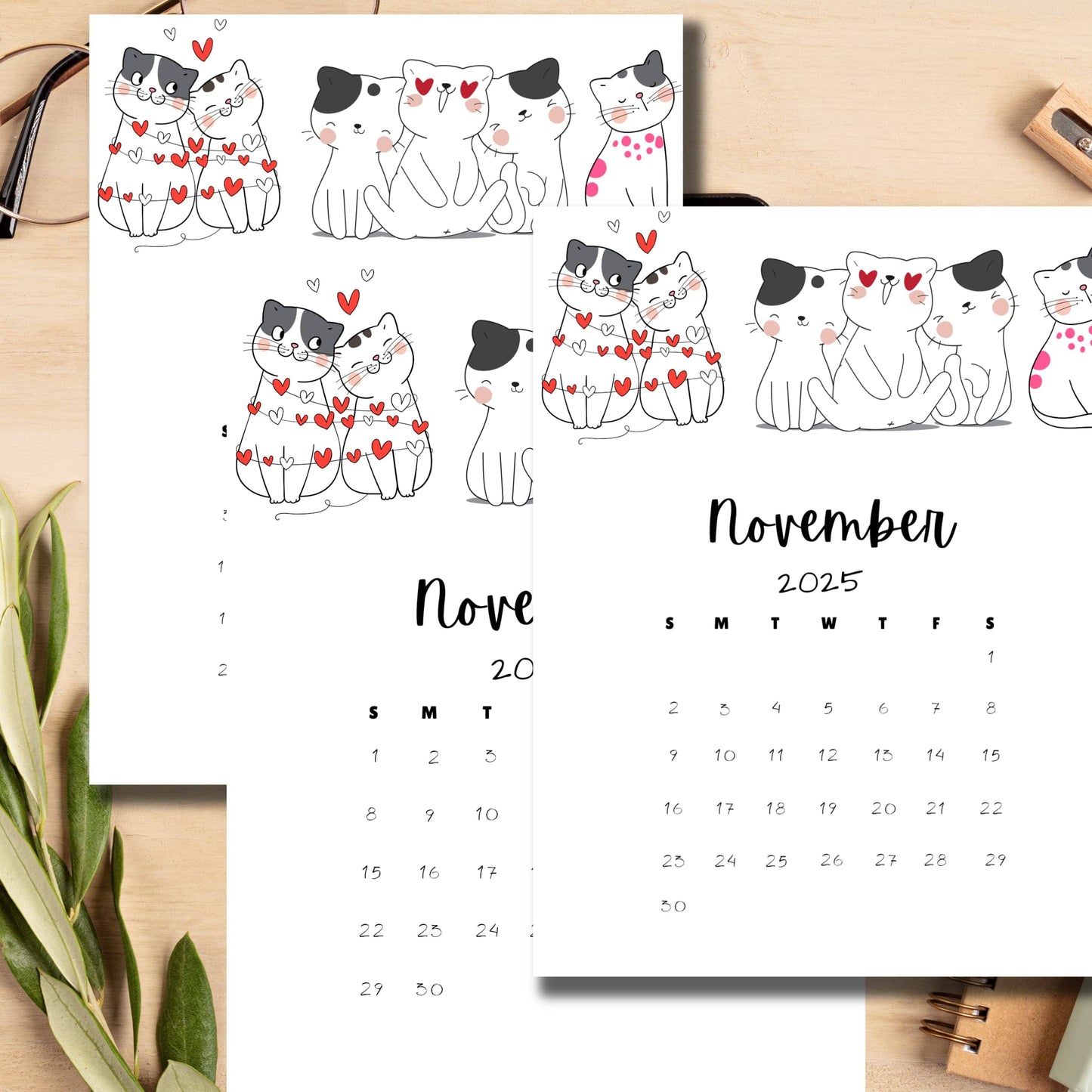 Printable November 2026 calendar with adorable black and white cat illustrations, featuring couples and group cats decorated with hearts. Vertical A4 layout with white background and handwritten style dates.