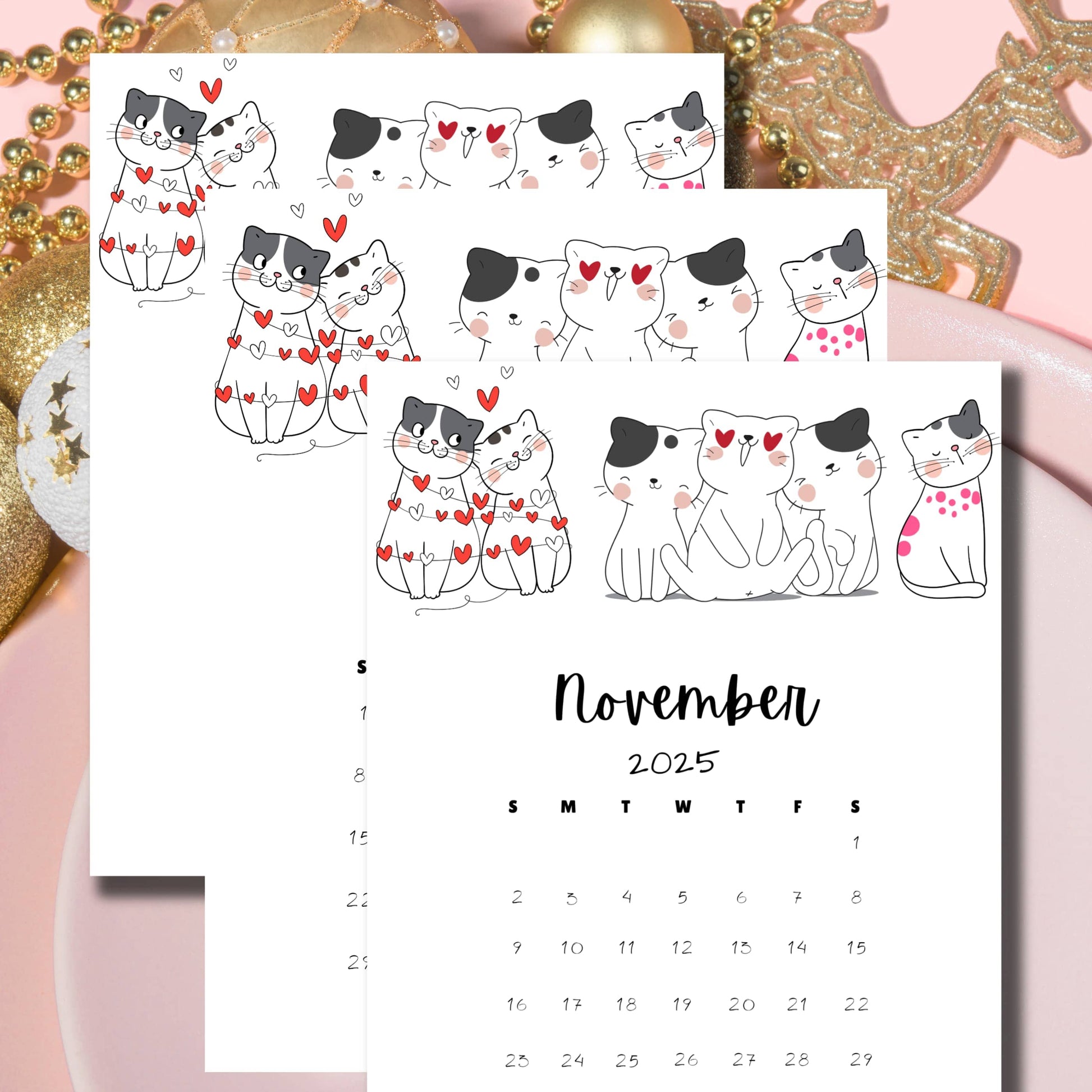 November 2025 calendar with kawaii cat illustrations on pink background with golden deer and holiday decorations. Features loving cat couples and group designs with heart motifs in vertical format.