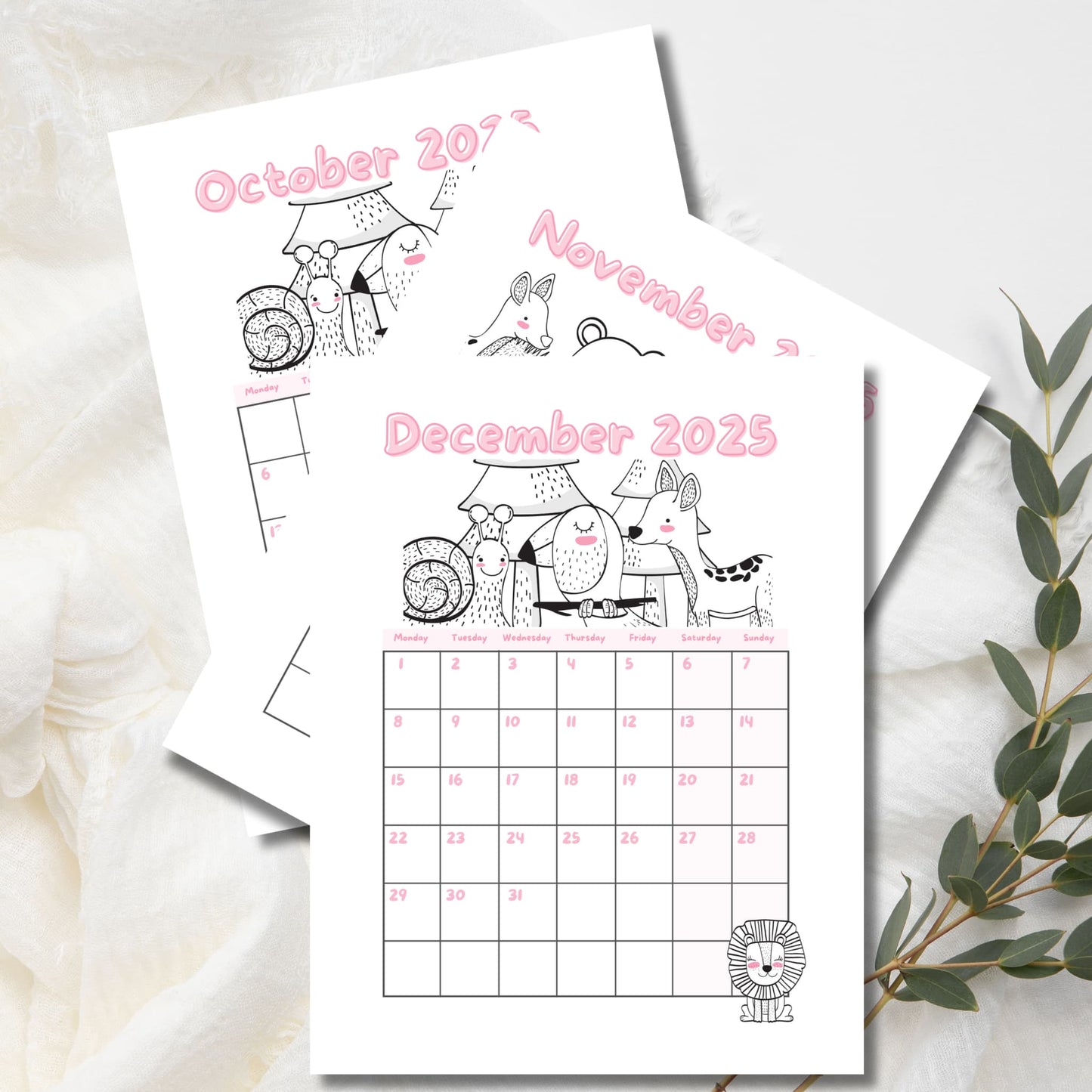 December 2025 calendar with woodland creatures line art and pink numbering. October-November pages peeking behind, Monday-start grid with eucalyptus sprig decoration.