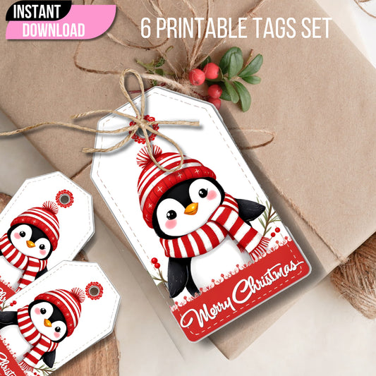 Closeup of Christmas penguin gift tag tied with jute twine, featuring penguin in red striped winter accessories and 'Merry Christmas' text on kraft paper background