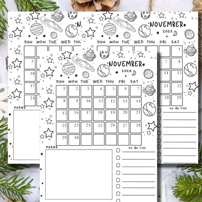 Three-year November calendar with hand-drawn planets, stars and doodles, featuring notes and to-do list sections, styled with pine branches