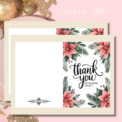 Free printable holiday thank you card with pink poinsettias and evergreen border, modern black calligraphy lettering, decorative divider, shown with gold ornaments, 11x8.5 format