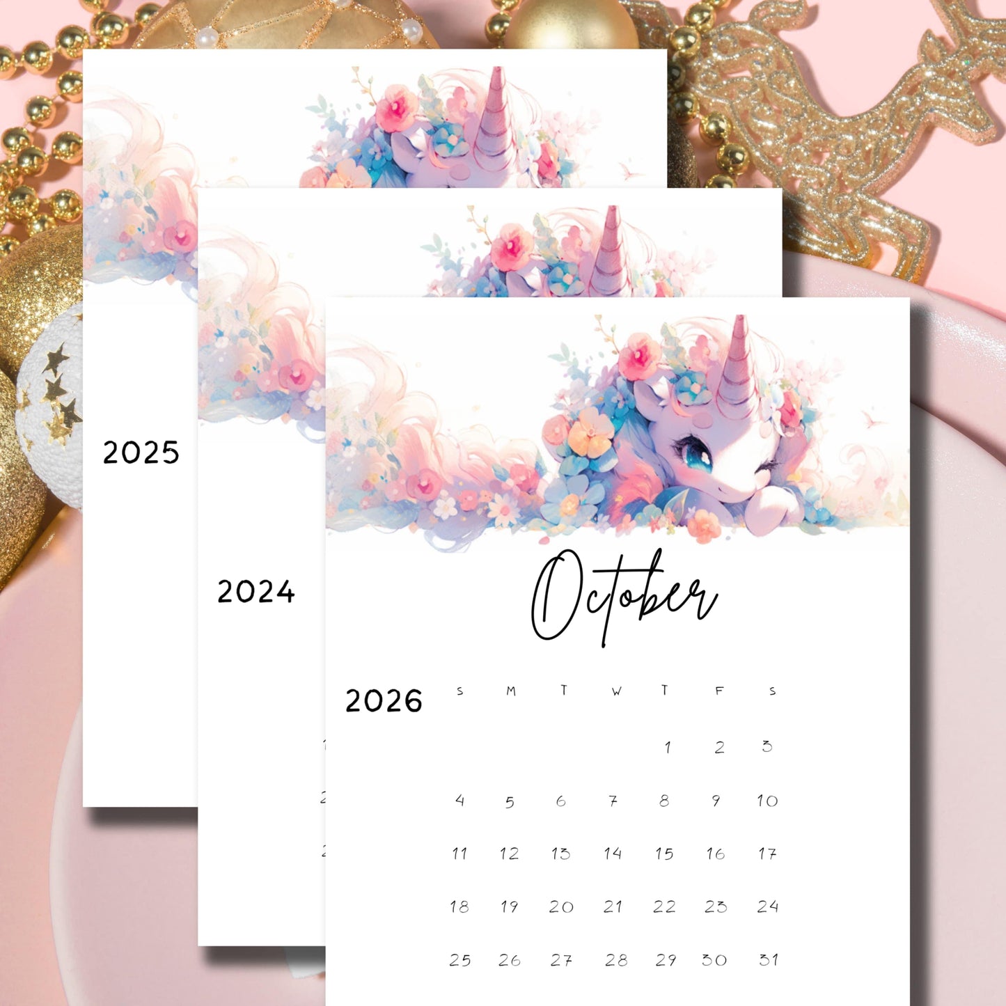 Flatlay of October 2025 calendar with adorable pink unicorn artwork, arranged on a festive background with golden decorations, showcasing the free printable design for school use.