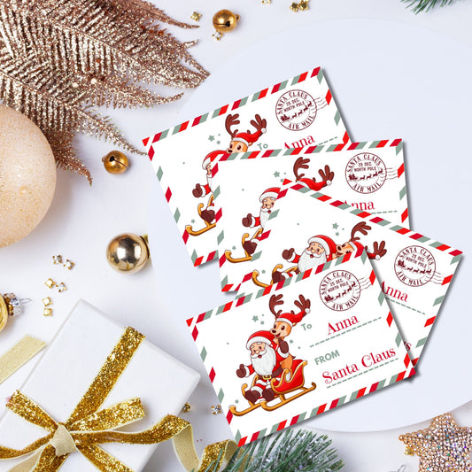 North Pole Special Delivery tags featuring Santa and reindeer on sleigh design with red and white striped border, displayed with gold Christmas ornaments and glitter decorations