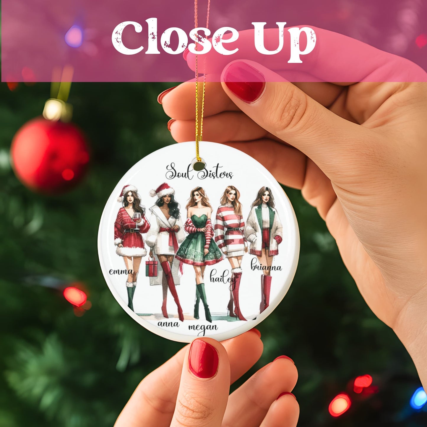 Close-up of Soul Sisters ceramic ornament hanging on Christmas tree with red ornaments and lights, showing detailed fashion illustrations of five friends in festive outfits