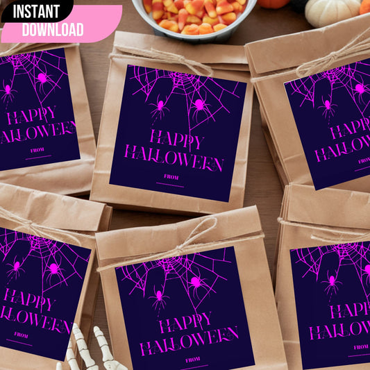 Purple and pink Halloween favor tags featuring spooky spider webs on navy background, displayed on kraft paper bags with twine bows, styled with candy corn and pumpkin decorations.