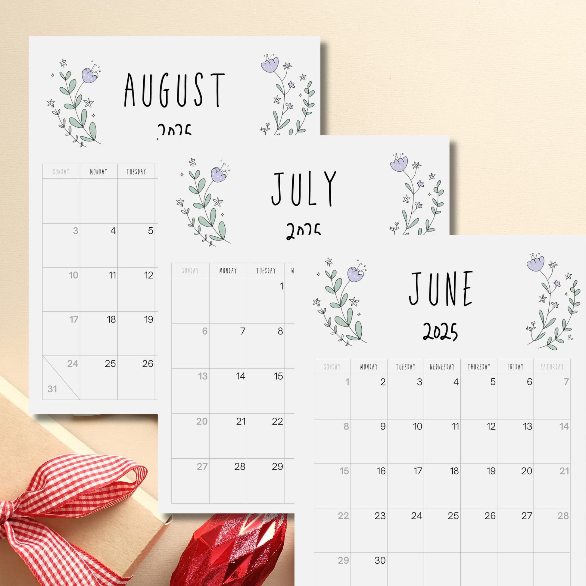 Summer months 2025 calendar collection featuring June-August, decorated with lavender blooms and mint foliage, displayed with red gingham ribbon