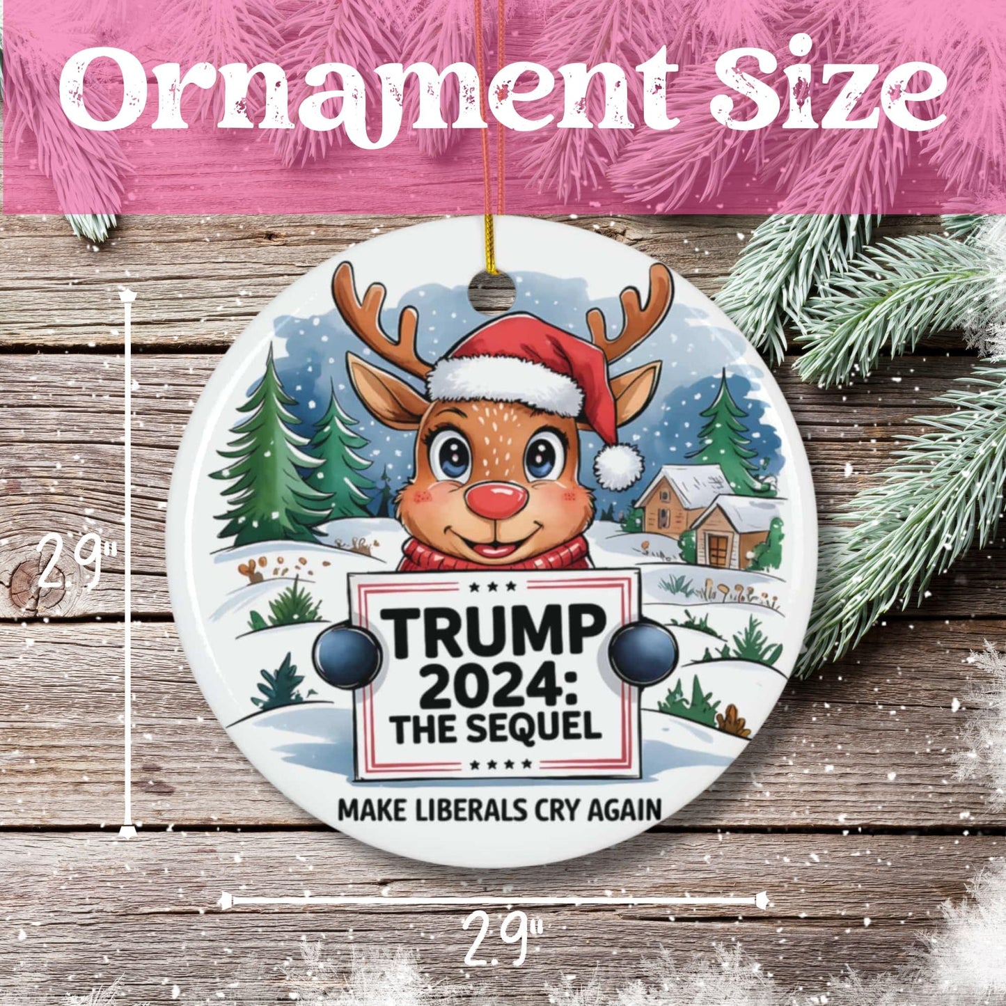 Product measurement showing 2.9-inch diameter ceramic circle ornament. Features winter landscape design with reindeer and cabin scene on white porcelain background with pine branch decoration.