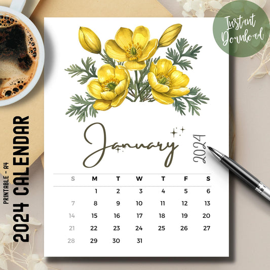  Winter Aconite floral January 2024-25 calendar on brown desk with coffee cup and pen.