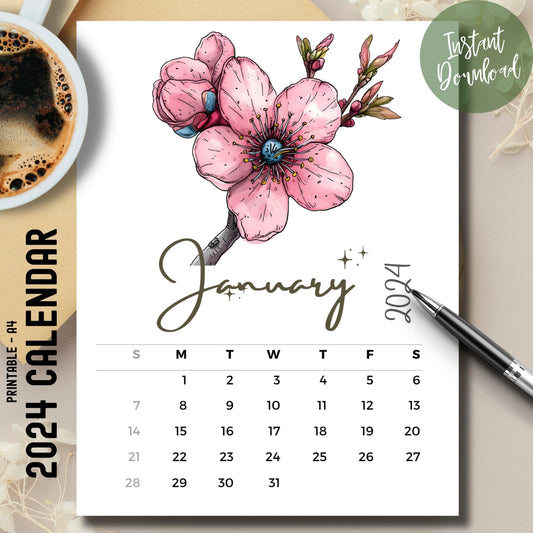 Winter Cherry January 2024-25 calendar on brown desk with coffee cup and pen.