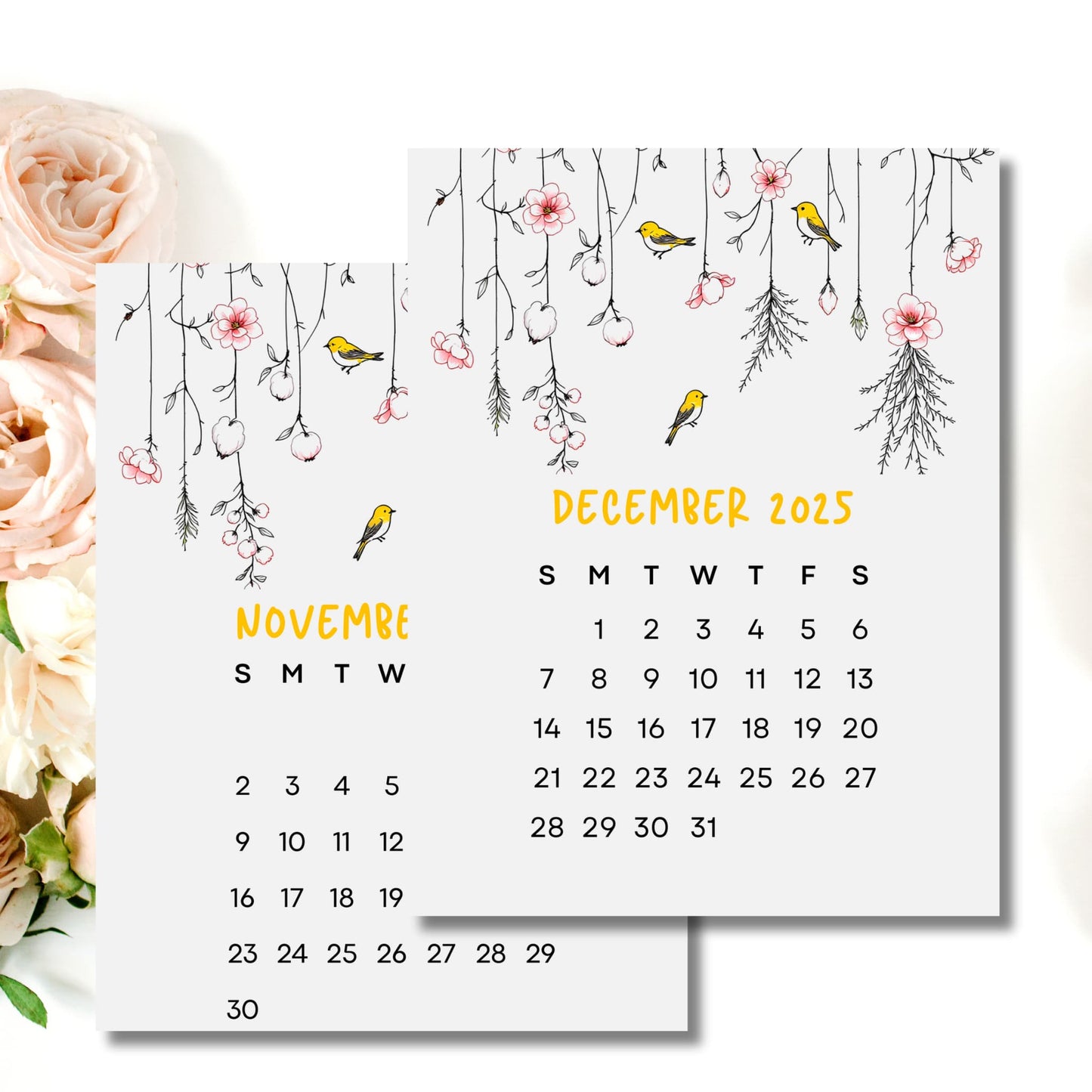 November and December 2025 calendar pages decorated with yellow finches and hanging cherry blossoms design, styled with blush roses photography