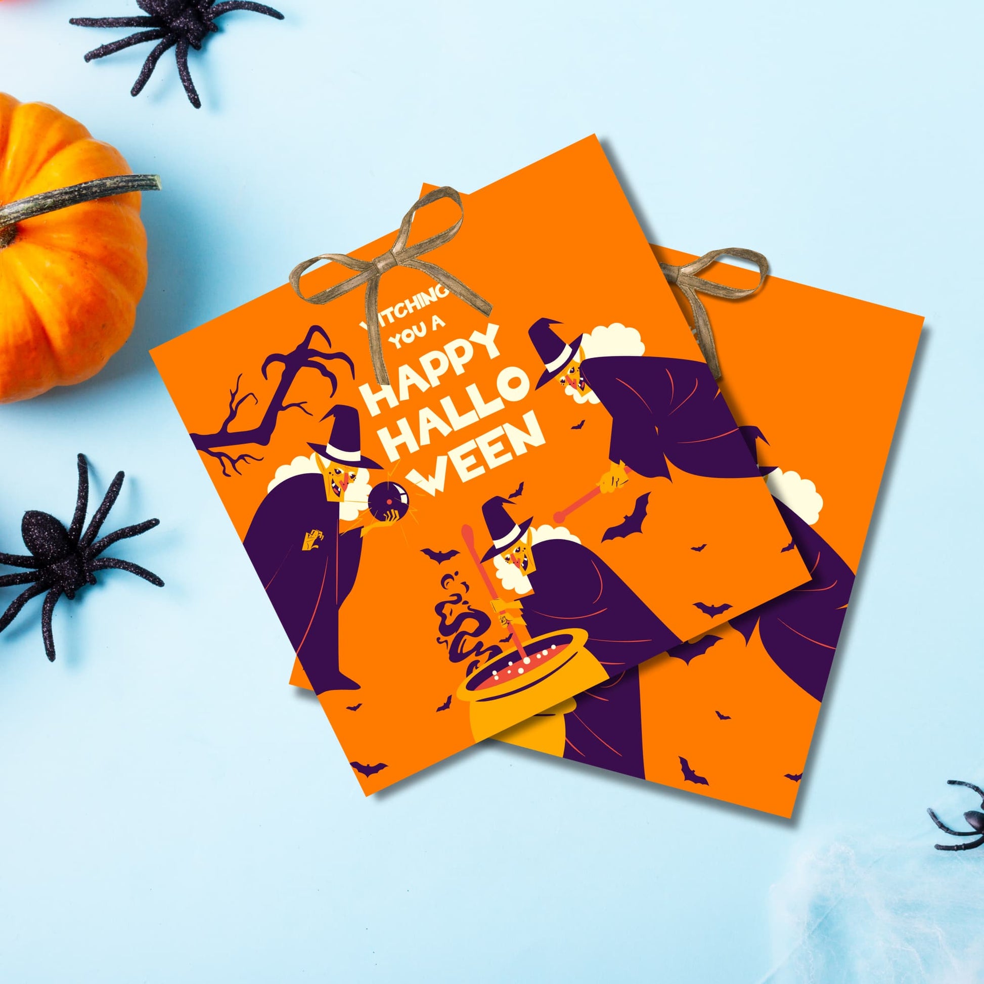 Multiple Halloween witch tags featuring magical brewing scene on bright orange background with flying bats, styled with decorative spiders and pumpkin on light blue surface.