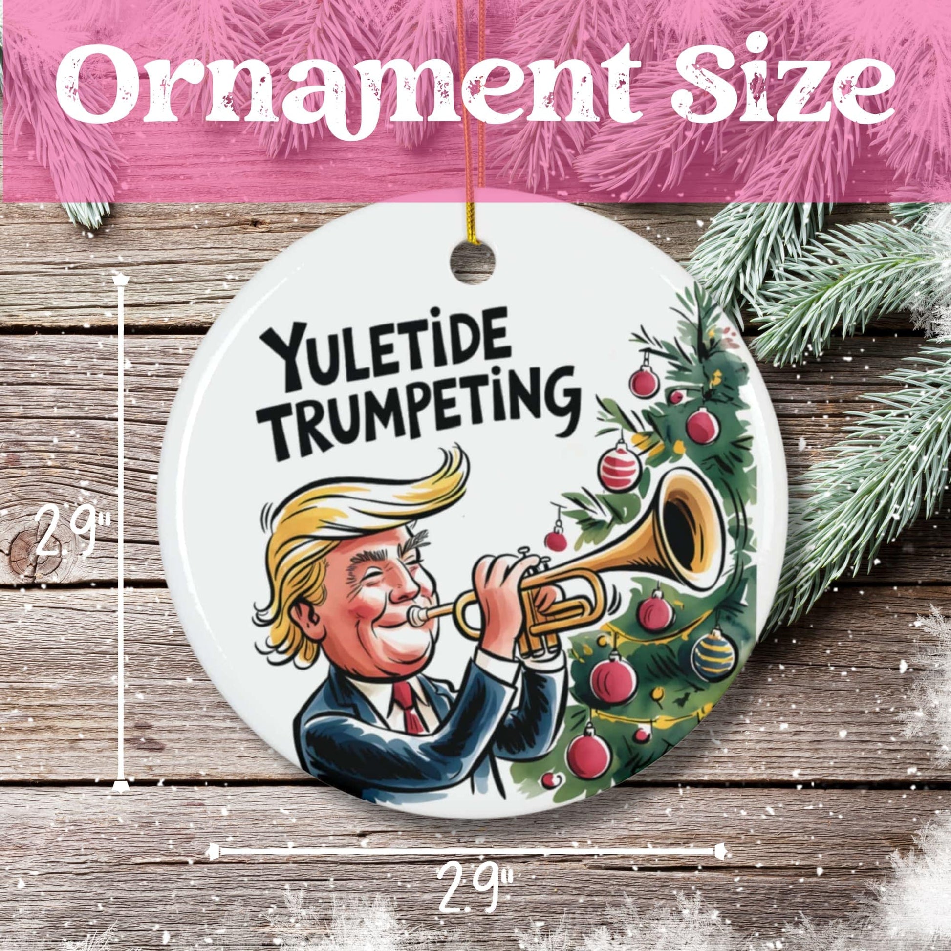 Size demonstration of 2.9-inch diameter ceramic holiday ornament with trumpet player and Christmas tree design, shown with measurement guide on wooden surface.